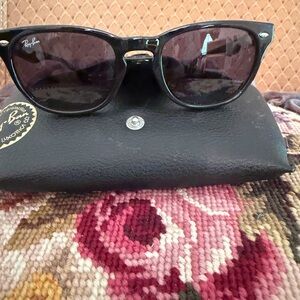 Ray-Ban Black Frame Sunglasses with Dark Lenses